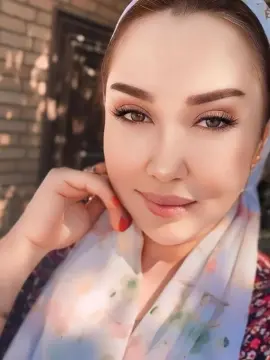 ديليارا من أوزبكستان تظهر ابتسامتها الدافئة